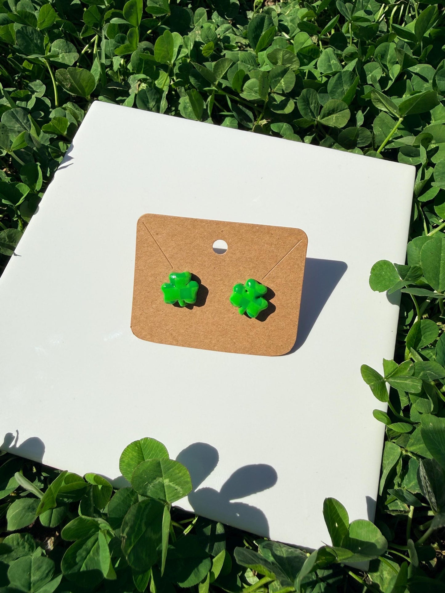 Handmade polymer clay checkered shamrock earrings