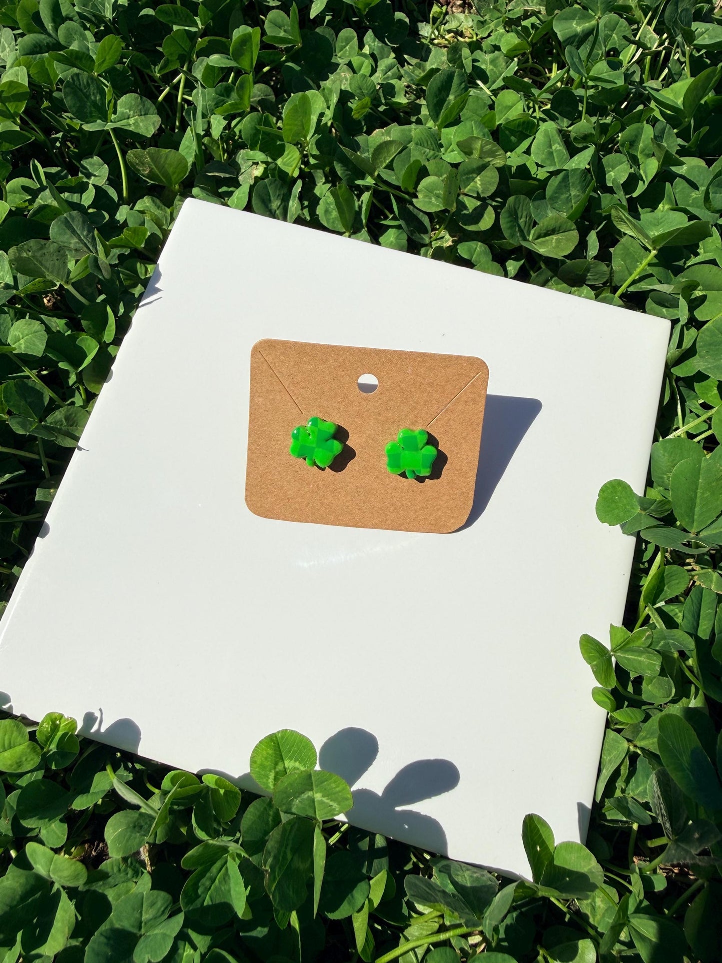 Handmade polymer clay checkered shamrock earrings
